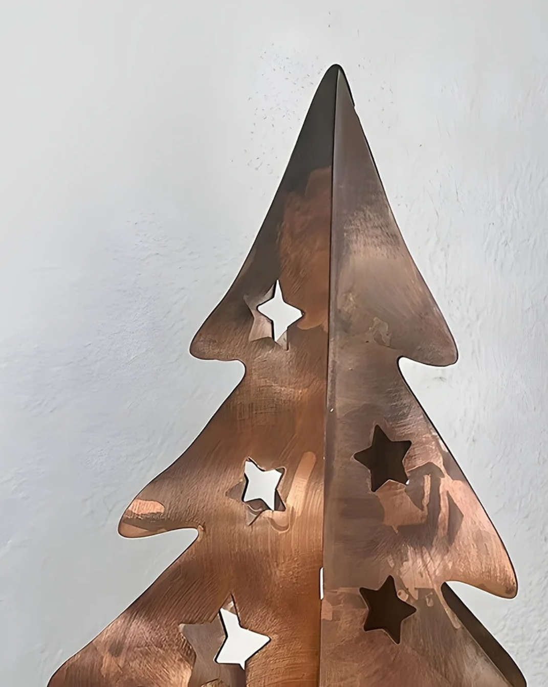 Metalen kerstboom-decoratie met steruitsnijding
